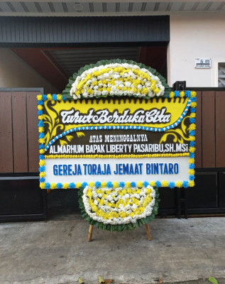 Papan Bunga Duka di Malanggah